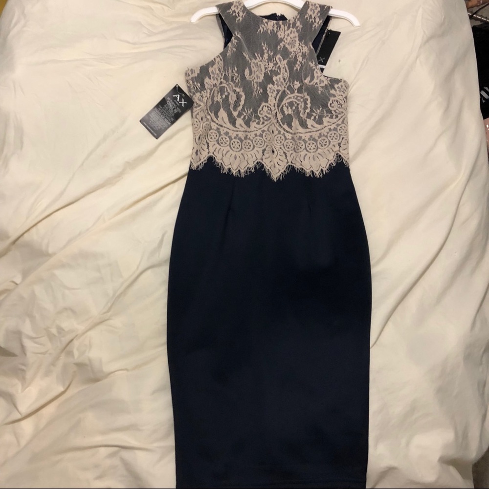 Sleeveless, slim fit, knee length, silk dress